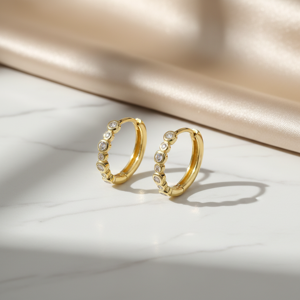 Gold hoops on marble